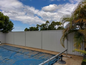 Colorbond fence around a backyard pool